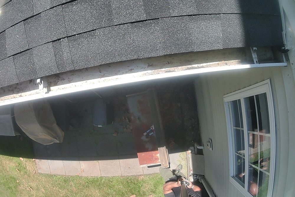 The same King of Prussia gutter completely clear and flowing after professional gutter cleaning